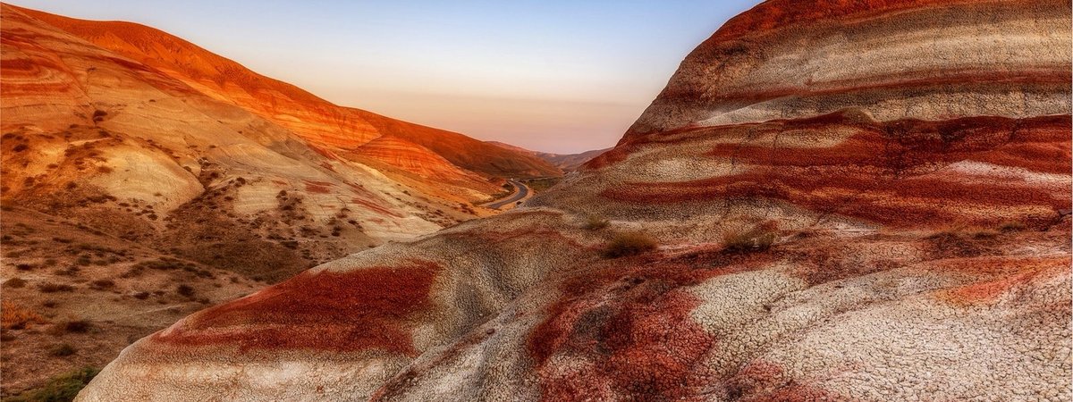 Prediction of Gamma Ray data from pre-stack seismic reflection partial angle stacks using Continuous Wavelet Transform and convolutional neural network approach