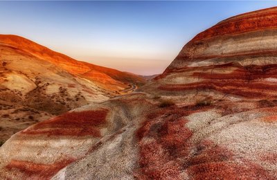 Prediction of Gamma Ray data from pre-stack seismic reflection partial angle stacks using Continuous Wavelet Transform and convolutional neural network approach